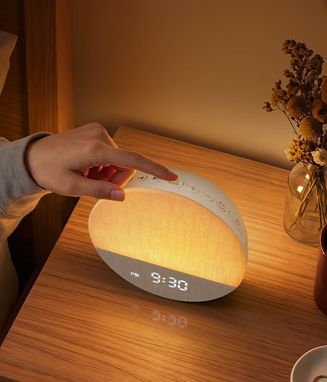 Hand operating the on-device controls of a Dreamegg Sunrise 1